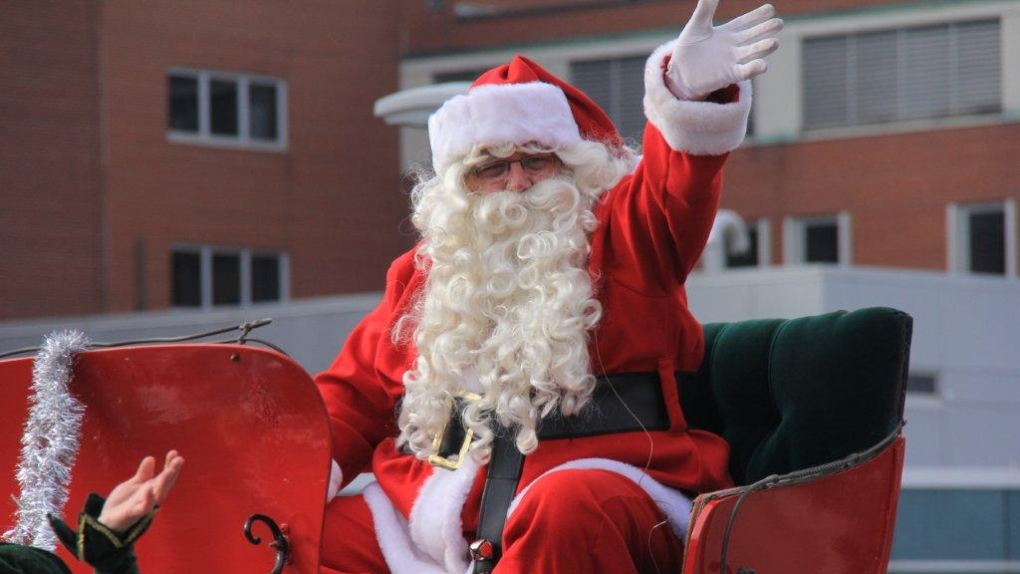 Santa Claus makes his annual appearance at the Kitchener-Waterloo Santa Claus Parade on Saturday, Nov. 16, 2013. (David Pettitt / CTV Kitchener)