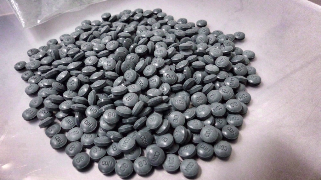Fentanyl pills are shown in an undated police handout photo. (Alberta Law Enforcement Response Teams)
