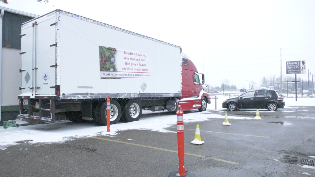 A transport truck is parked outside of Frannie’s Restaurant and Bakery on Hwy. 7 between Kitchener and Guelph as part of a donation drive for the temporary emergency warning shelter at St. Andrew’s Presbyterian Church. December 8, 2021. (Ricardo Veneza/CTV Kitchener)