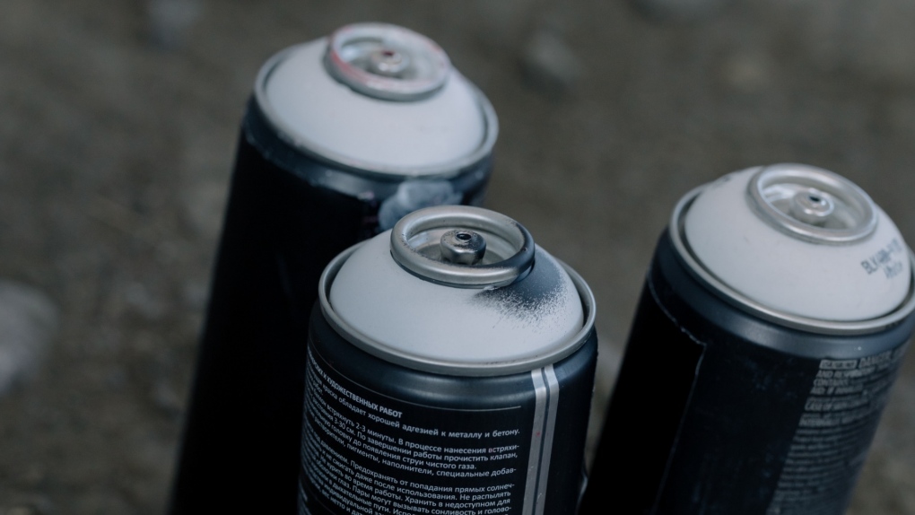 Cans of spray paint are seen in this stock photo. (cottonbro/Pexels)