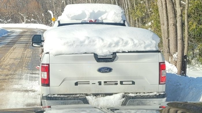 A pickup truck covered in snow that was stopped by Ontario Provincial Police. (OPP/Twitter)