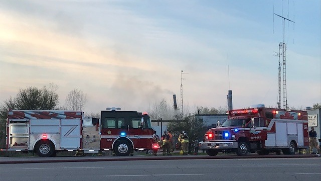 Firefighters at the scene of a structure fire near Colborne St. in Brantford. (May 11, 2022)