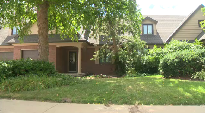 A house on John Street in Waterloo that had a car crash into it. (Terry Kelly/CTV Kitchener) (July 30, 2022)