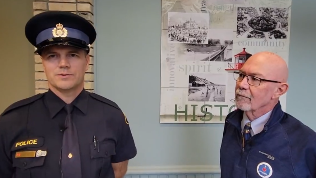 A screenshot from a video of acting Goderich Mayor Myles Murdoch and Huron OPP Const. Jamie Stanley. (OPP/Twitter)
