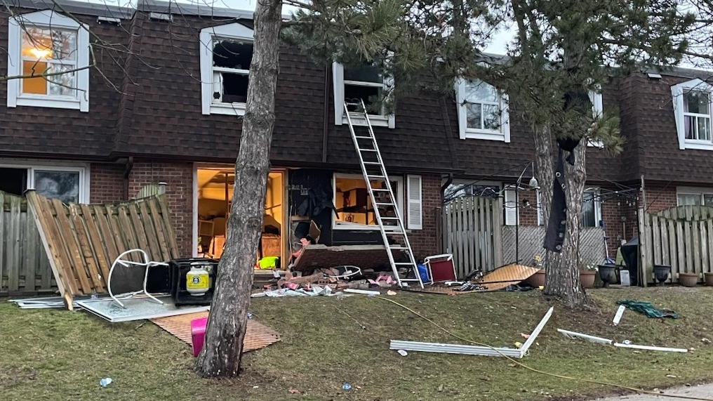 Four individuals, including two children, were transported to hospital Wednesday evening following a house explosion in Kitchener. (Karis Mapp/CTV Kitchener) 