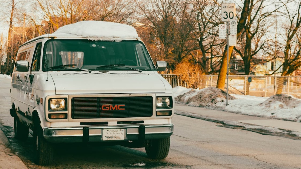 A white GMC van is pictured in a stock photo. (Ali Cuhadaroglu/Pexels)