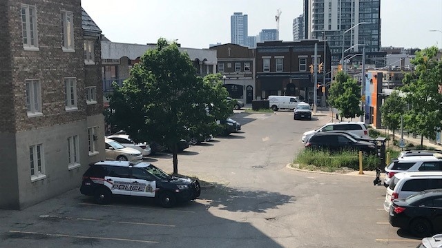 Waterloo regional police investigate a stabbing at Queen Street South and Charles Street West in Kitchener on June 1, 2023. (CTV Kitchener)