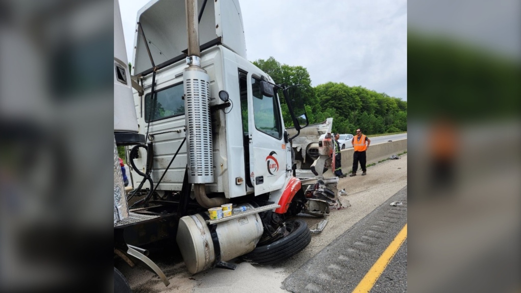 Driver taken to hospital after tractor-trailer catches fire in