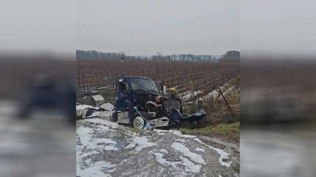 Fuel tanker rollover closes QEW