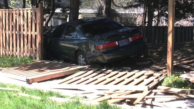 Car through fence